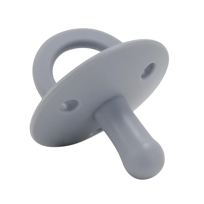 A gray silicone baby pacifier soother with a loop and a protruding tip.