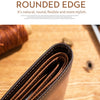 A close-up of a brown leather bifold wallet with rounded edges resting on a wooden surface.