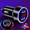 A black dual USB fast car charger with a blue LED display showing 12.8 volts and 3.1A output.