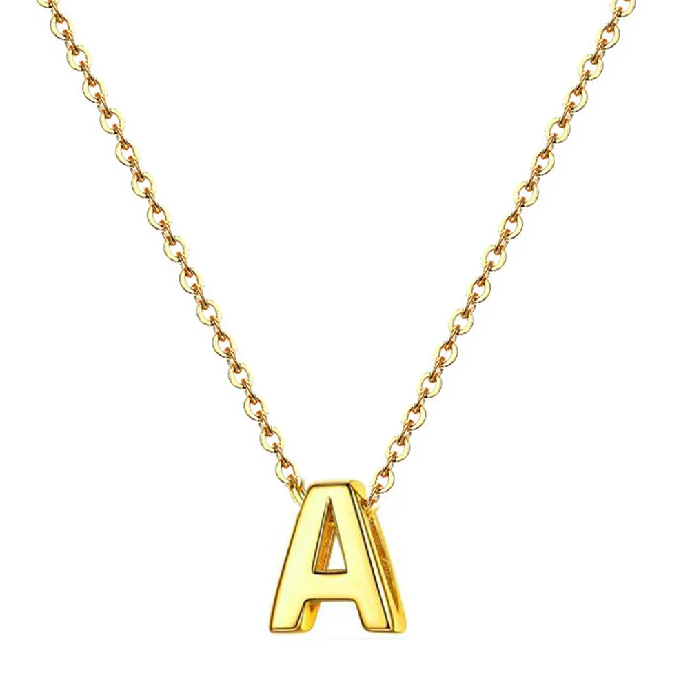 A gold chain necklace with a large letter A pendant