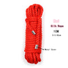 Red silk rope with a metal cover, 10 meters long, coiled for bondage play.