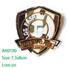Embroidered US Marine Corps medal patch with a gold border and white letter G on a dark olive background