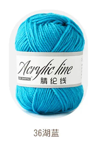 A ball of bright turquoise acrylic line yarn labeled as 36-gauge thread.