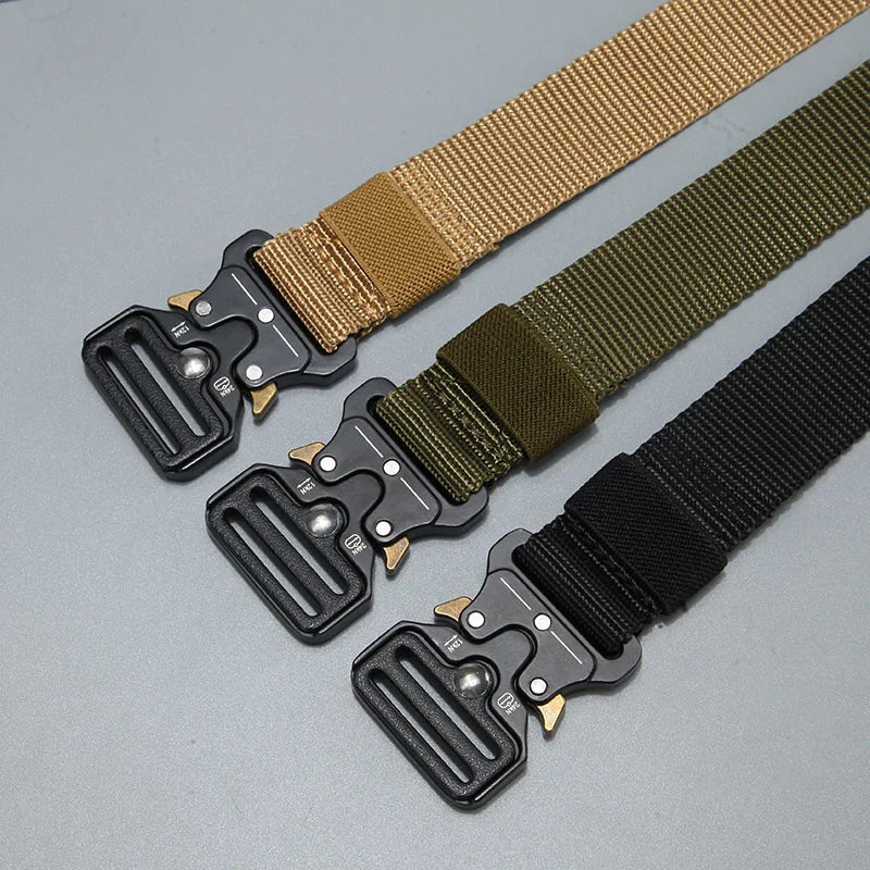 A close-up of a men's tactical nylon belt with secure metal buckles and various tan, olive green, and black webbing.