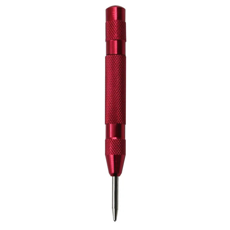 A close-up view of a red spring-loaded automatic center punch tool.