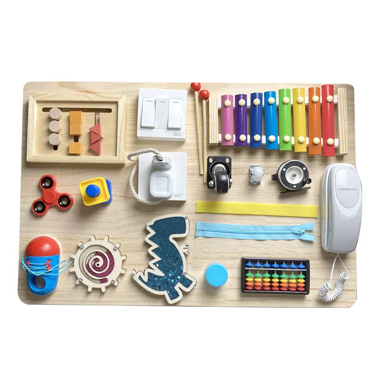 A wooden Montessori busy board featuring various colorful and textured learning accessories for toddlers.