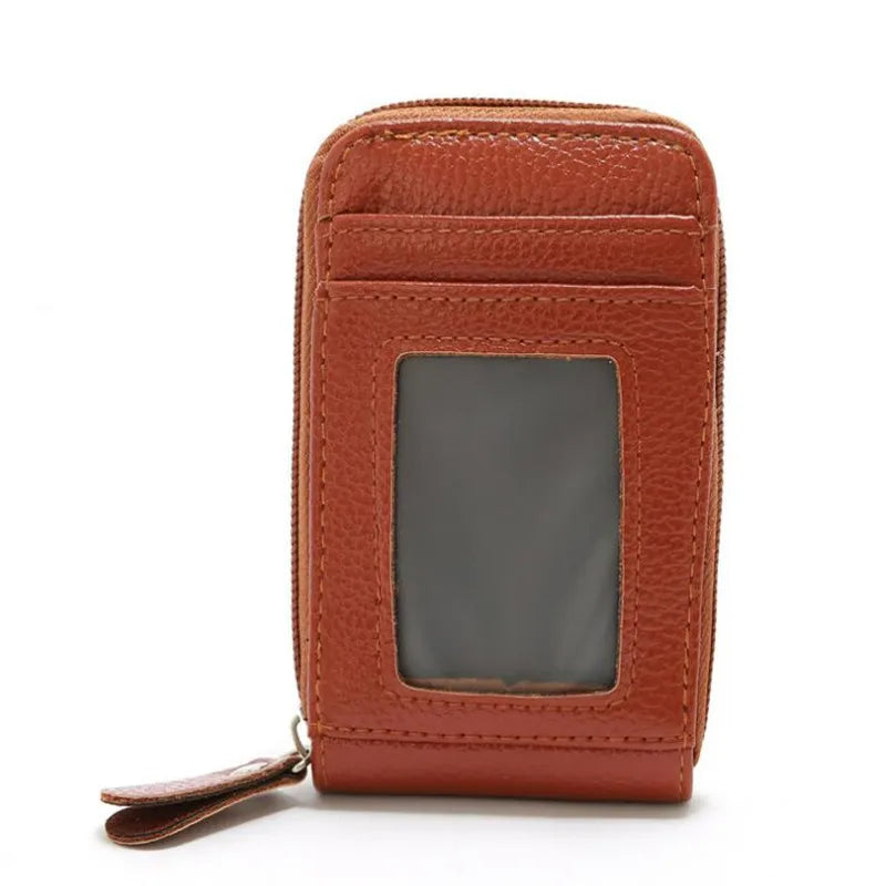 A brown genuine leather RFID-blocking card holder wallet with a clear window.