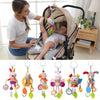 A set of soft plush baby rattle toys featuring various cartoon animals like rabbits, monkeys, and birds with hanging bells.