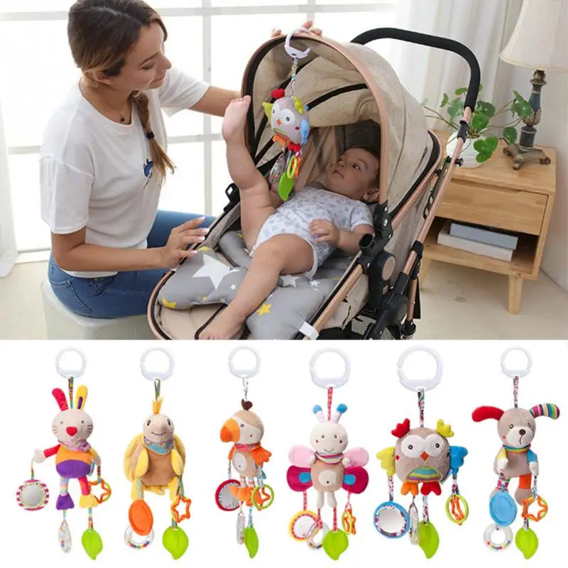A set of soft plush baby rattle toys featuring various cartoon animals like rabbits, monkeys, and birds with hanging bells.