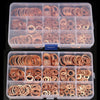 A clear plastic container filled with numerous copper sealing washers and sump plugs.
