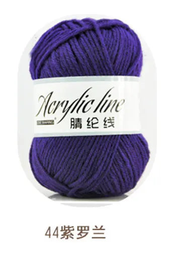 Purple acrylic line yarn ball labeled as 44 gauge knitting and crochet thread.