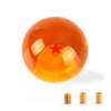 A glossy orange shift knob with a red star design shown against a white background.