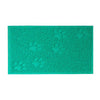 A rectangular teal cat litter mat with a repeating paw print design.