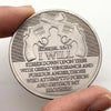 Antique silver plated commemorative coin featuring a patriotic two-gun design and biblical verse