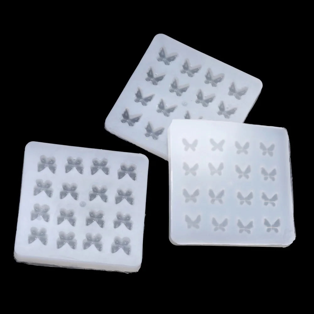 White epoxy resin mold with butterfly shapes for DIY jewelry making