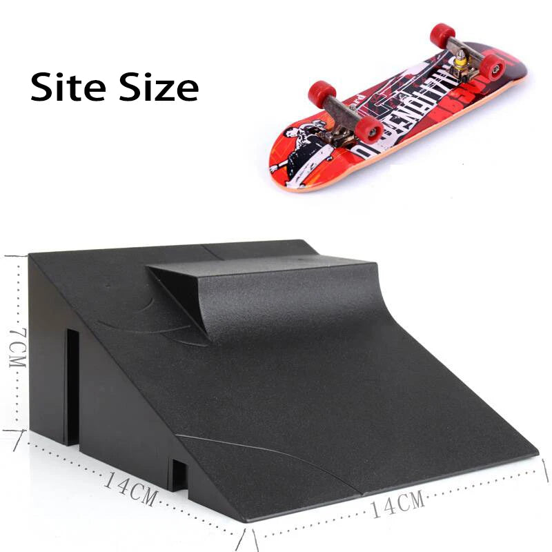 A black finger skateboard set with a red deck and a black park ramp, shown next to a size reference.