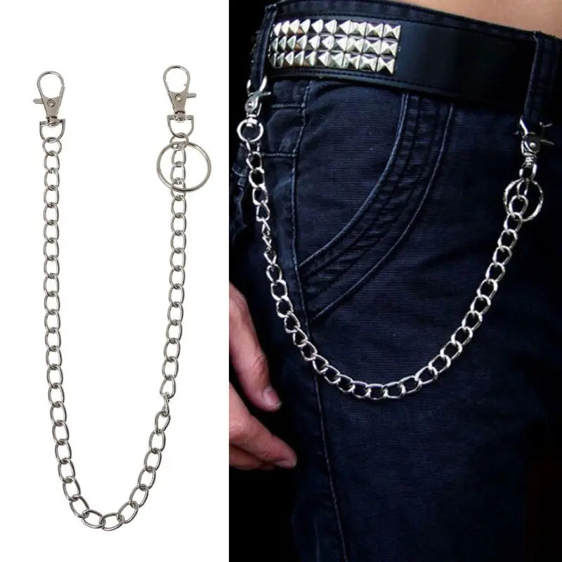 A silver chrome steel punk chain belt accessory with a keyring is shown attached to dark denim jeans.