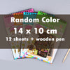 A stack of colorful scratch art note sheets and a wooden pen are displayed on a gray background.