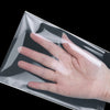 A hand is shown pressing against a clear self-adhesive resealable storage bag.