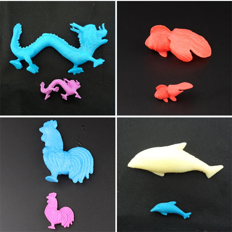 Set of colorful magical water-growing ocean animal toys including blue, pink, and orange sea creatures.
