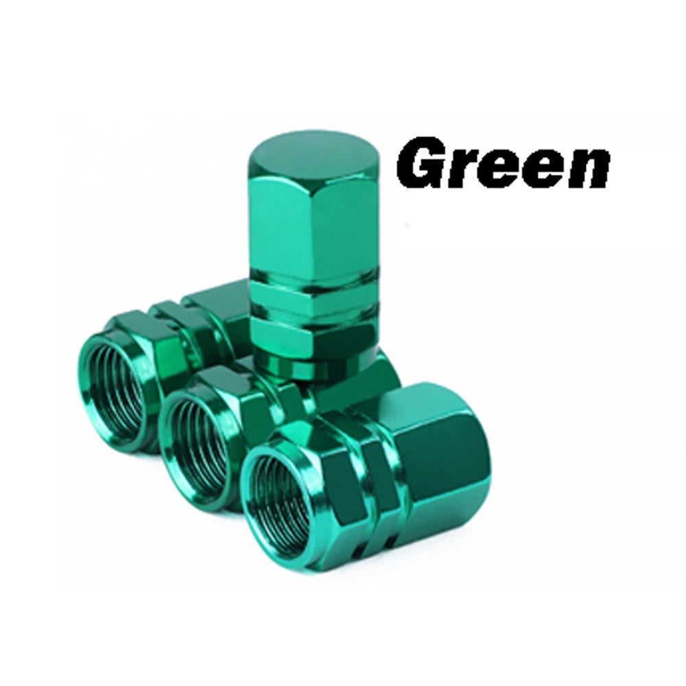 A green durable aluminum tire valve cap shown in various sizes.