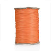 A spool of bright orange waxed cotton cord used for jewelry making.