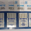 Pack of five Schmidt universal sewing machine needles labeled 130/705 H and 110/18.