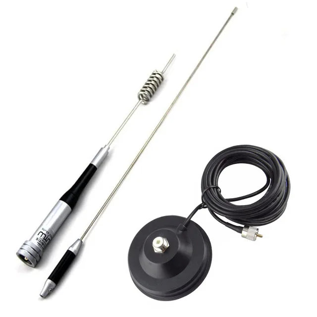 A dual band VHF/UHF mobile antenna with a coiled wire and mounting base.