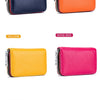 Four genuine leather card holders in navy blue, orange, yellow, and rose red with zippers