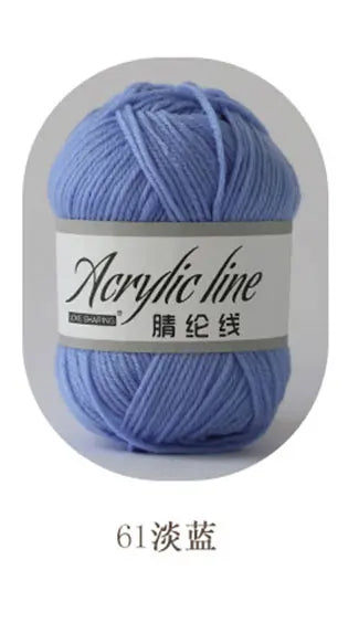 A ball of light blue acrylic line yarn labeled as 61 strength for knitting and crochet.