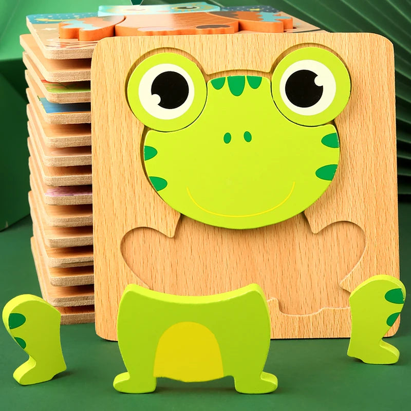 A wooden 3D frog puzzle set featuring a green frog cutout and accompanying pieces for toddlers.