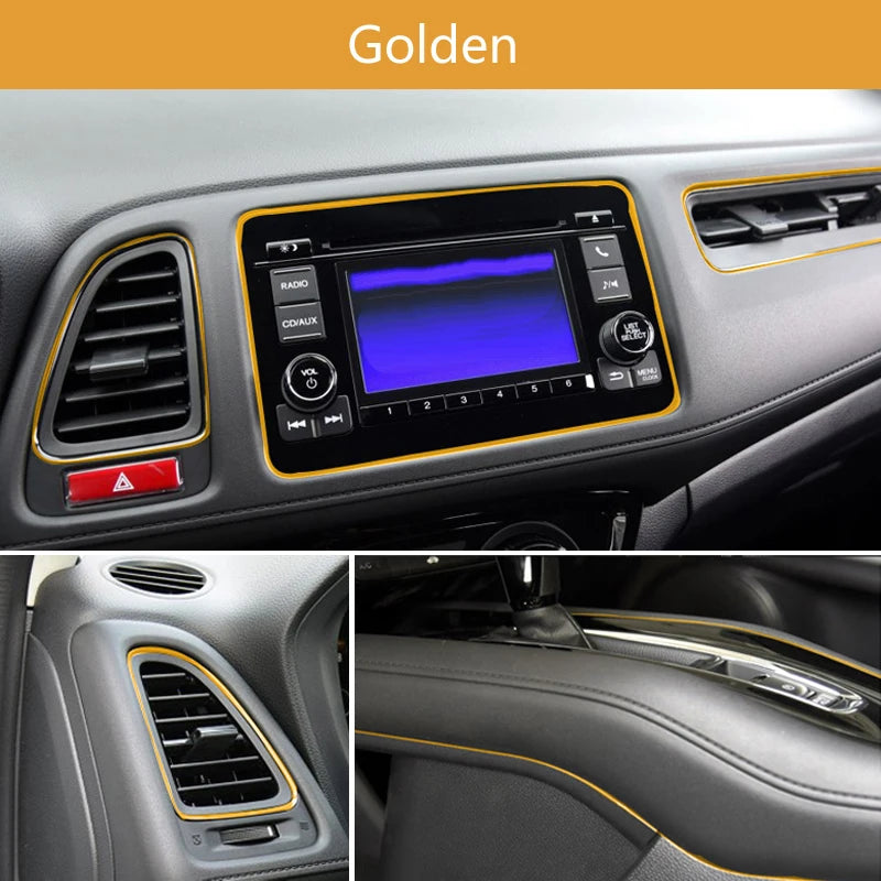 Golden interior trim strips and radio controls in a car dashboard