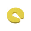A yellow foam door stopper with a finger pinch protection design.