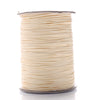A spool of thin, light beige waxed cotton cord for jewelry making.