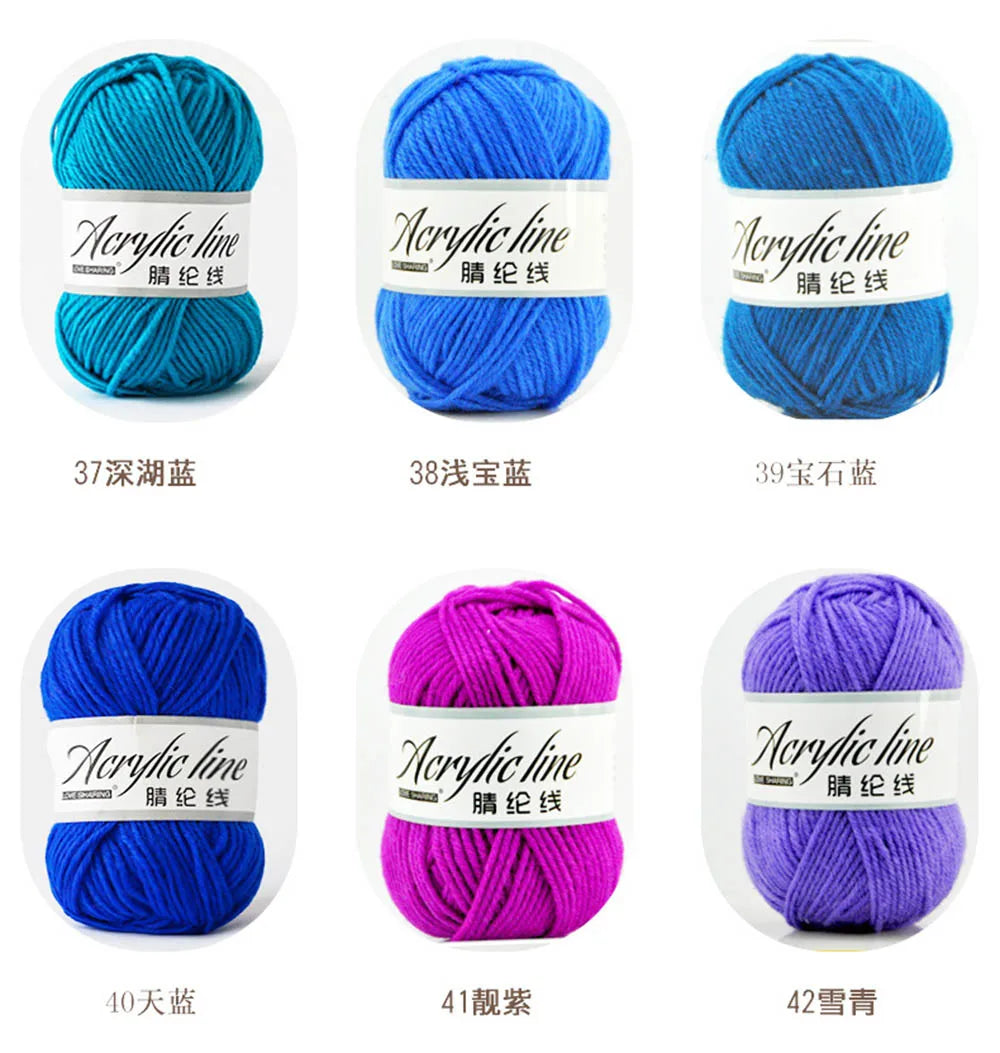 A collection of soft acrylic yarn balls in various colors including turquoise, blue, purple, and pink.