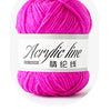 A ball of bright pink acrylic yarn labeled Acrylic line in color 14 bright pink thread.