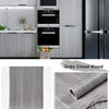 Roll of grey cloud wood self-adhesive wallpaper film used for decorative surface covering