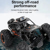 Black 1:18 RC off-road SUV with large tires and an HD FPV camera