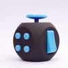 A dark gray 12-sided fidget cube with a light blue top and several round buttons.