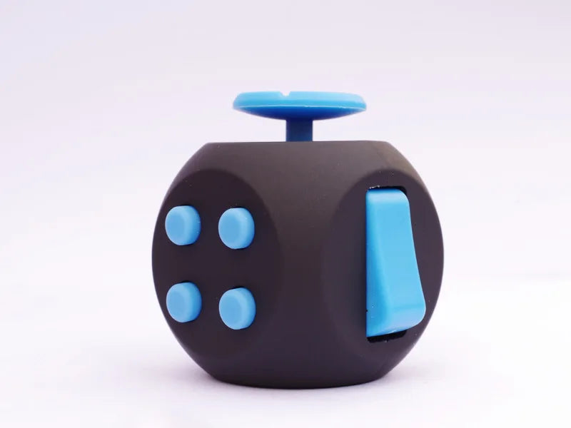 A dark gray 12-sided fidget cube with a light blue top and several round buttons.