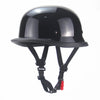 Matte black vintage German half-face motorcycle helmet with a textured visor and black straps