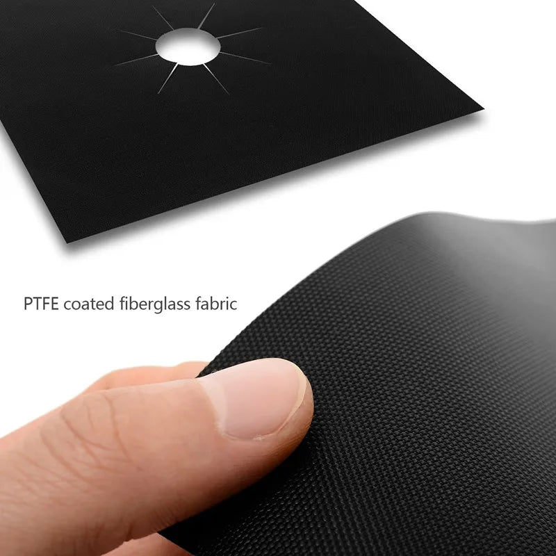 A hand is holding a black PTFE coated fiberglass fabric mat with a star-shaped hole.
