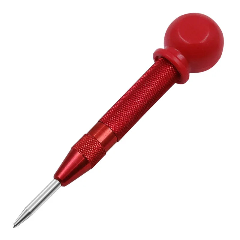 A red spring-loaded automatic center punch tool with a textured handle and sharp point.