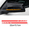 Black reflective vinyl mirror decal applied to a car's exterior panel.