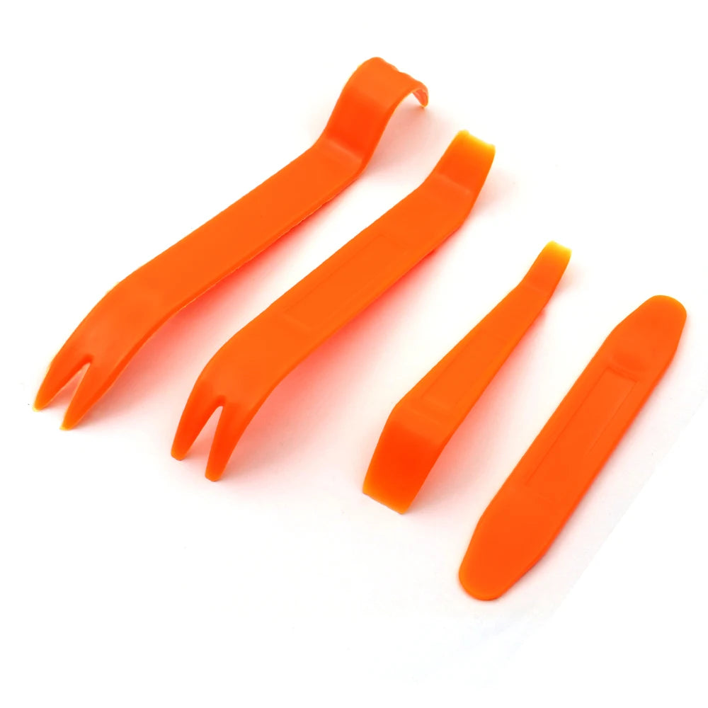 Orange trim clip removal pliers used for auto upholstery and panel work