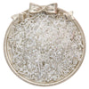 A circular dish filled with mixed clear and white glass seed beads tied with a bow.
