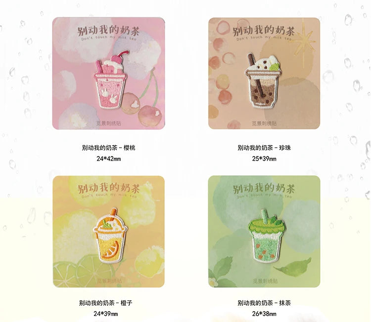 Various embroidered iron-on patches featuring cute food designs like ice cream and fruit in pink, yellow, and green colors.