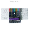 A set of 12 metallic pens is displayed next to a white mechanical keyboard.