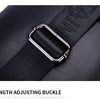 Close-up of a black leather strap adjusting buckle on a men's chest bag.