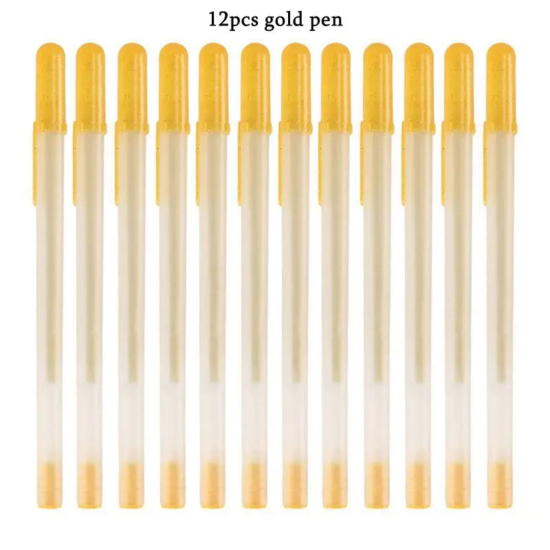 A set of 12 gold gel pens with white bodies and silver tips for writing on dark paper.